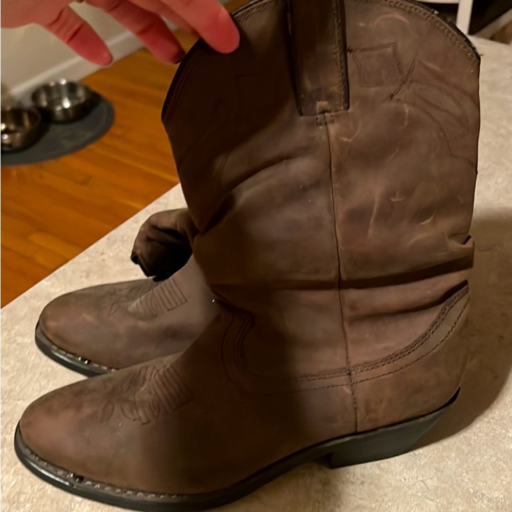 Women’s leather boots, not sure of brand.